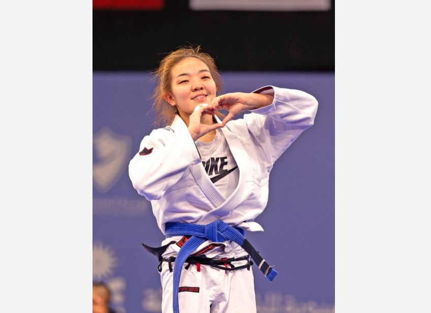 <p>Kazakh jiu-jitsu athlete Leila Rakhimzhanova celebrates after winning her bronze medal match yesterday in the girls&rsquo; under-63kg category. Her &lsquo;heart&rsquo; gesture is an illustration of the feelings of the thousands of competitors, coaches, officials, support staff, and fans from Bahrain and across the continent who were a part of the third Asian Youth Games in the kingdom, as the mega multi-sport event wraps up this evening with the official closing ceremony at Khalifa Sports City Arena in Isa Town.</p>
<p>Picture: AHMED ALFARDAN</p>
